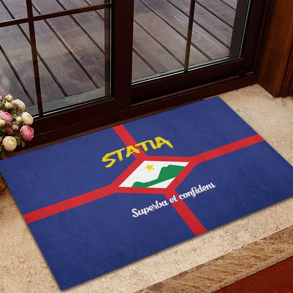 Blue rubber doormat on patio, featuring coat of arms and "Superba et confident"