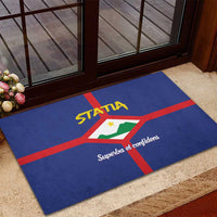 Blue rubber doormat on patio, featuring coat of arms and "Superba et confident"