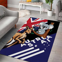 Blue area rug featuring kangaroo and koala with “AUSTRALIA” and star pattern.