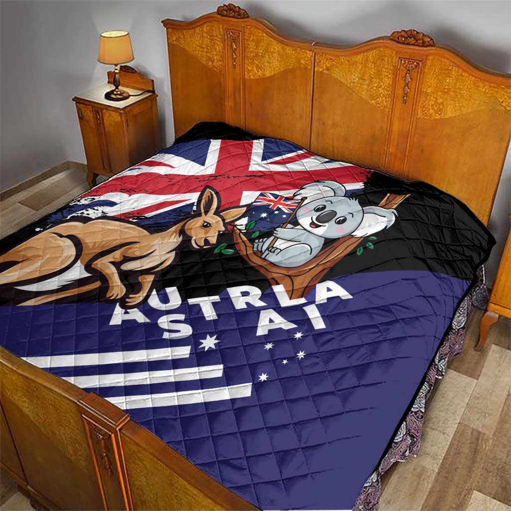 Quilted blanket in black, blue, and red with koala and kangaroo on bed