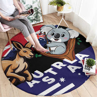 Round koala and kangaroo rug showing bold white AUSTRALIA lettering on dark fabric