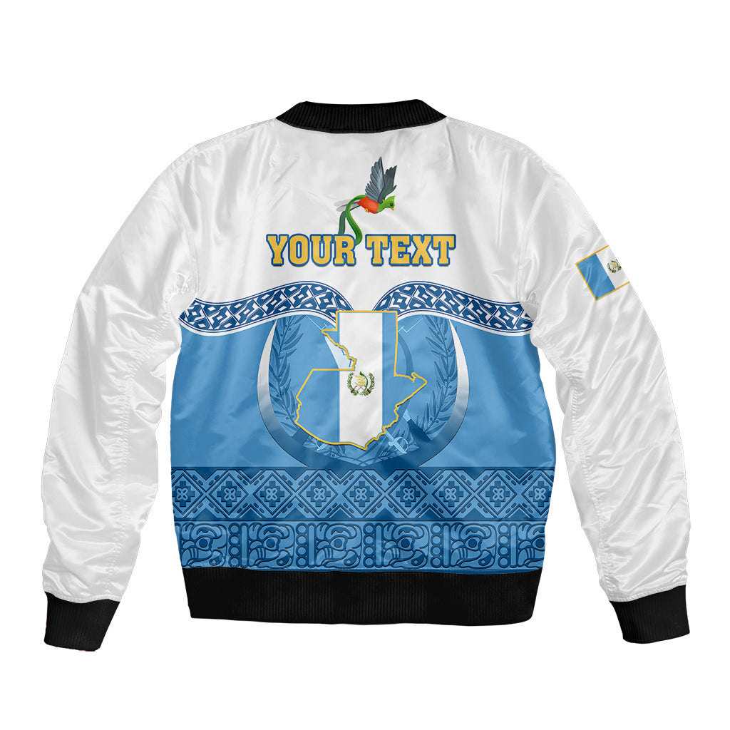 Personalized bomber jacket, white with blue crest graphic and 'YOUR TEXT' on back