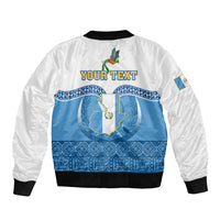 Personalized bomber jacket, white with blue crest graphic and 'YOUR TEXT' on back