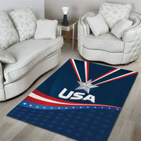 Blue patriotic area rug with “USA” text, central star, and red-white stripes with star pattern