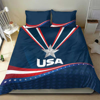 Blue USA star bedding set with central medal star, USA text, and matching pillow shams