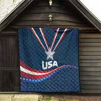 USA star medal quilt hanging on wall, blue design with big white star and red wave stripes