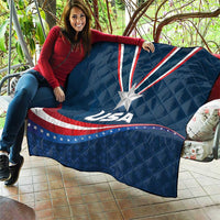 USA star medal quilt draped on patio, blue with white star and red/white wave stripes