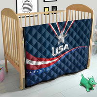 USA star medal quilt on crib, blue with white star and red/white curved wave stripes