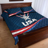 Blue quilt with large central star and USA lettering, red-white stripes, two pillows