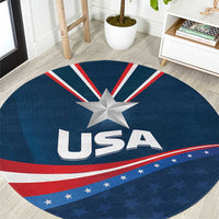 Round blue carpet close-up with large USA star, 'USA' text, and blue red stripes