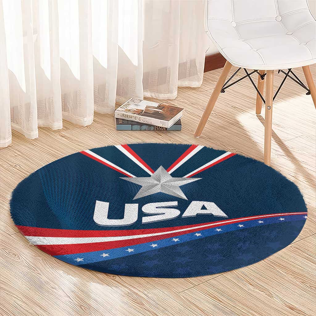 Round blue carpet with centered USA star, 'USA' text, and red white stripe band
