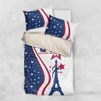 Reversible-style bedding set showing navy star field, red stripes, and Eiffel Tower graphic