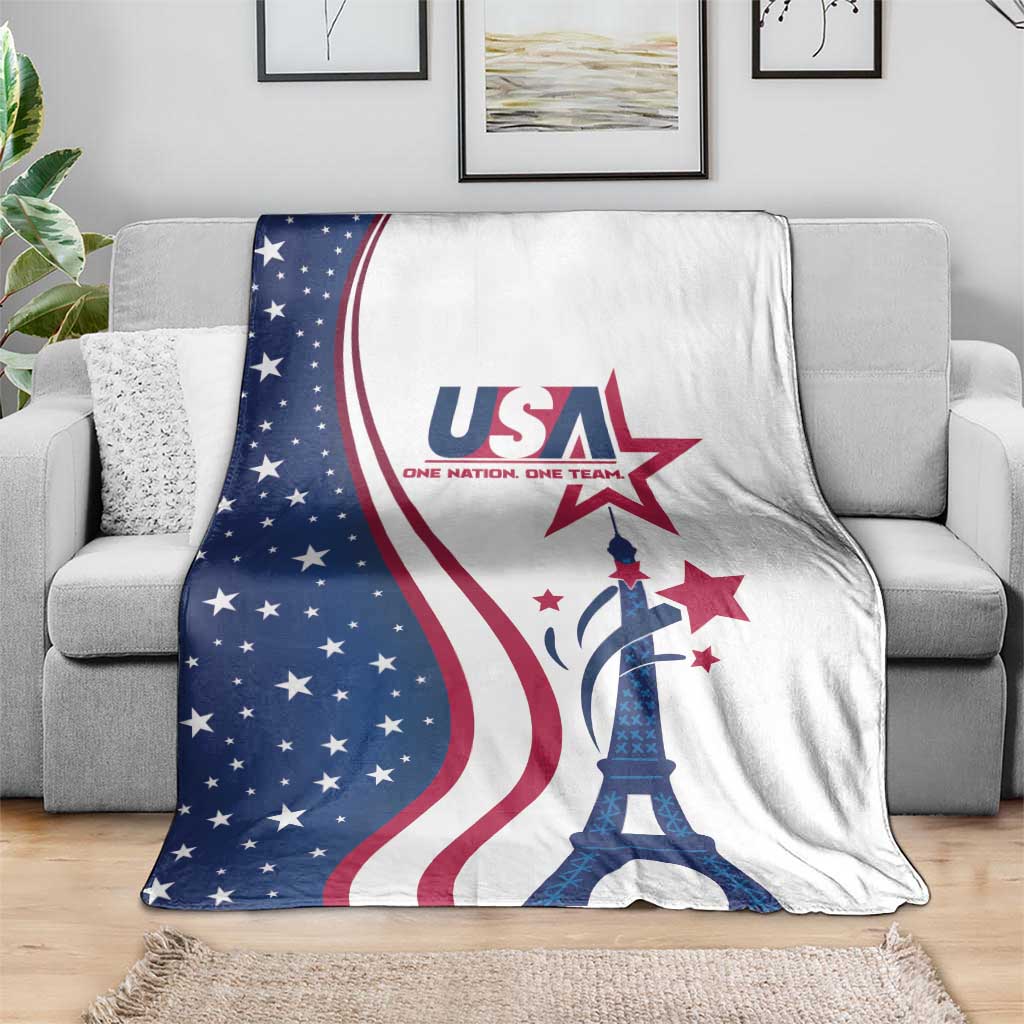 USA Eiffel Tower blanket with red stars and curved flag stripes, draped over gray sofa
