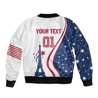White USA bomber jacket with red/blue graphics, Eiffel Tower, ribbed knit cuffs