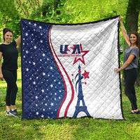 Rectangular USA-themed quilt spread outdoors, blue stars on left, white on right, Eiffel Tower