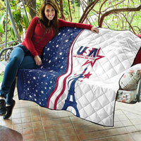 USA-themed quilt draped over outdoor seating, blue stars, white backing, red stripes, Eiffel Tower