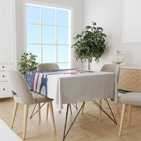 White tablecloth on dining table with Eiffel Tower and US stars-and-stripes design