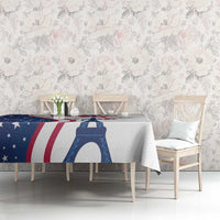 White tablecloth featuring Eiffel Tower and US stars-and-stripes pattern on dining table