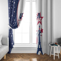 Side view of window curtains with US flag stars and Eiffel Tower print on navy/white