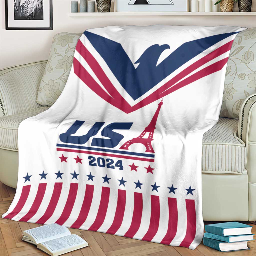 White USA-themed throw blanket with navy V, red stripes, stars, and Eiffel Tower artwork
