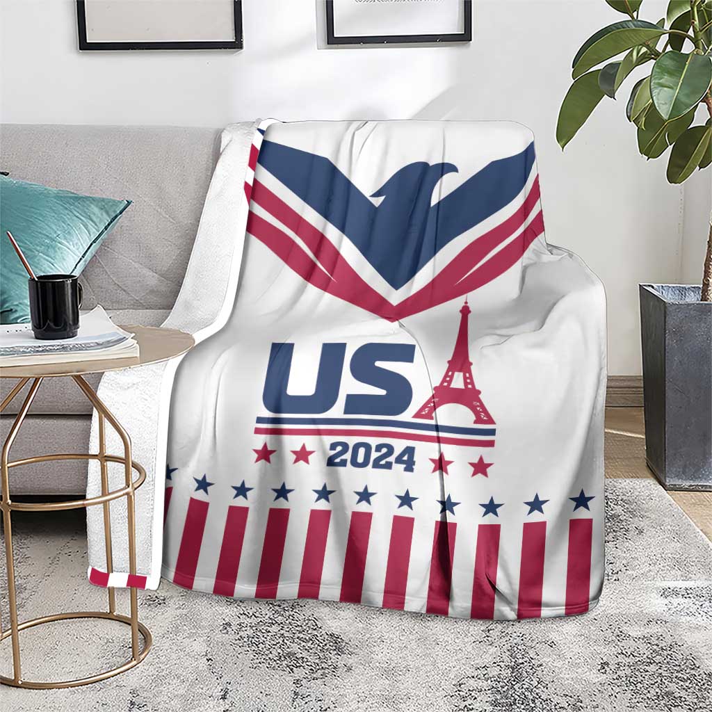 White throw blanket with navy V chevron, red stripes, stars, and Eiffel Tower design