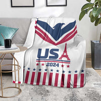 White throw blanket with navy V chevron, red stripes, stars, and Eiffel Tower design