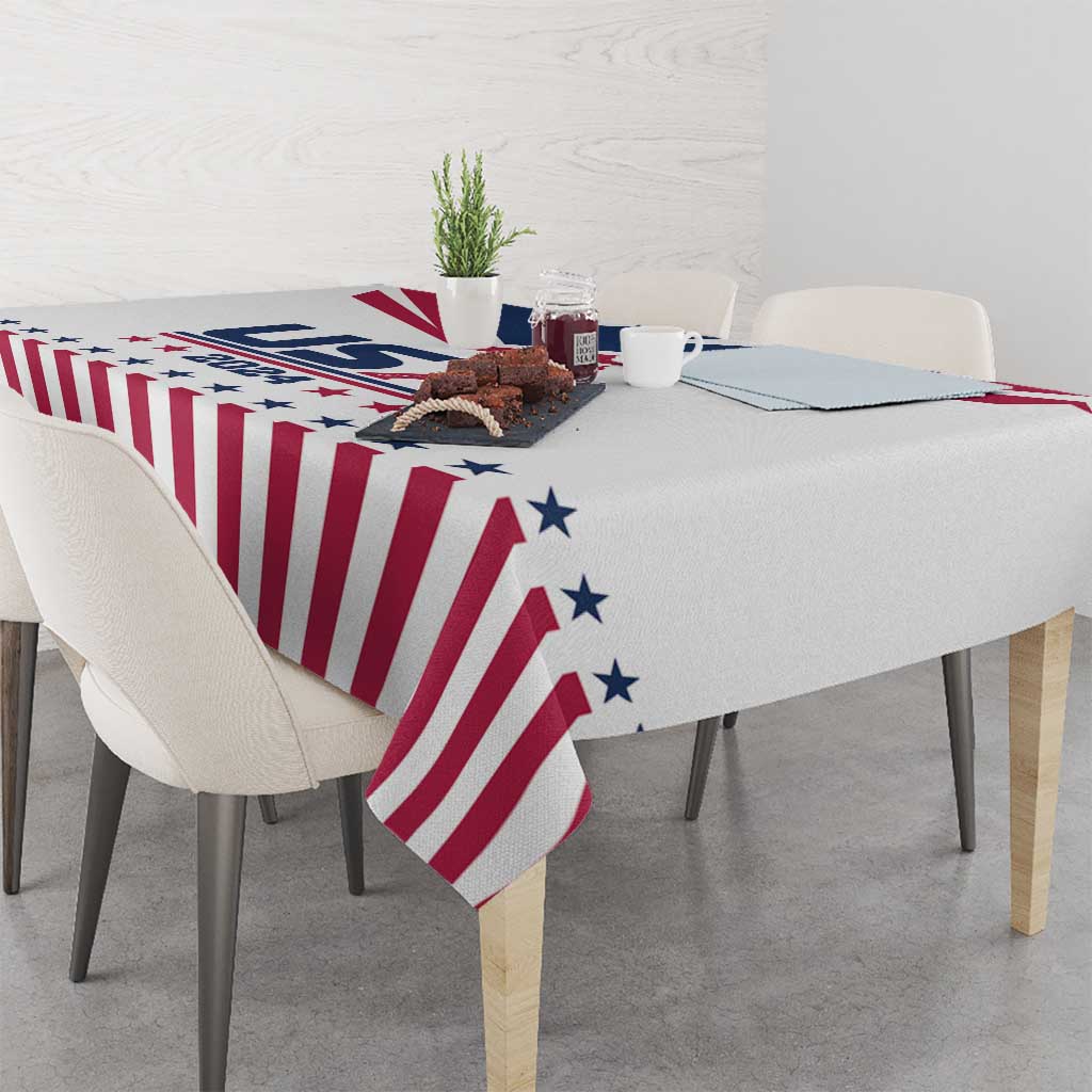 Red-and-white striped tablecloth with blue stars and Eiffel Tower print on table