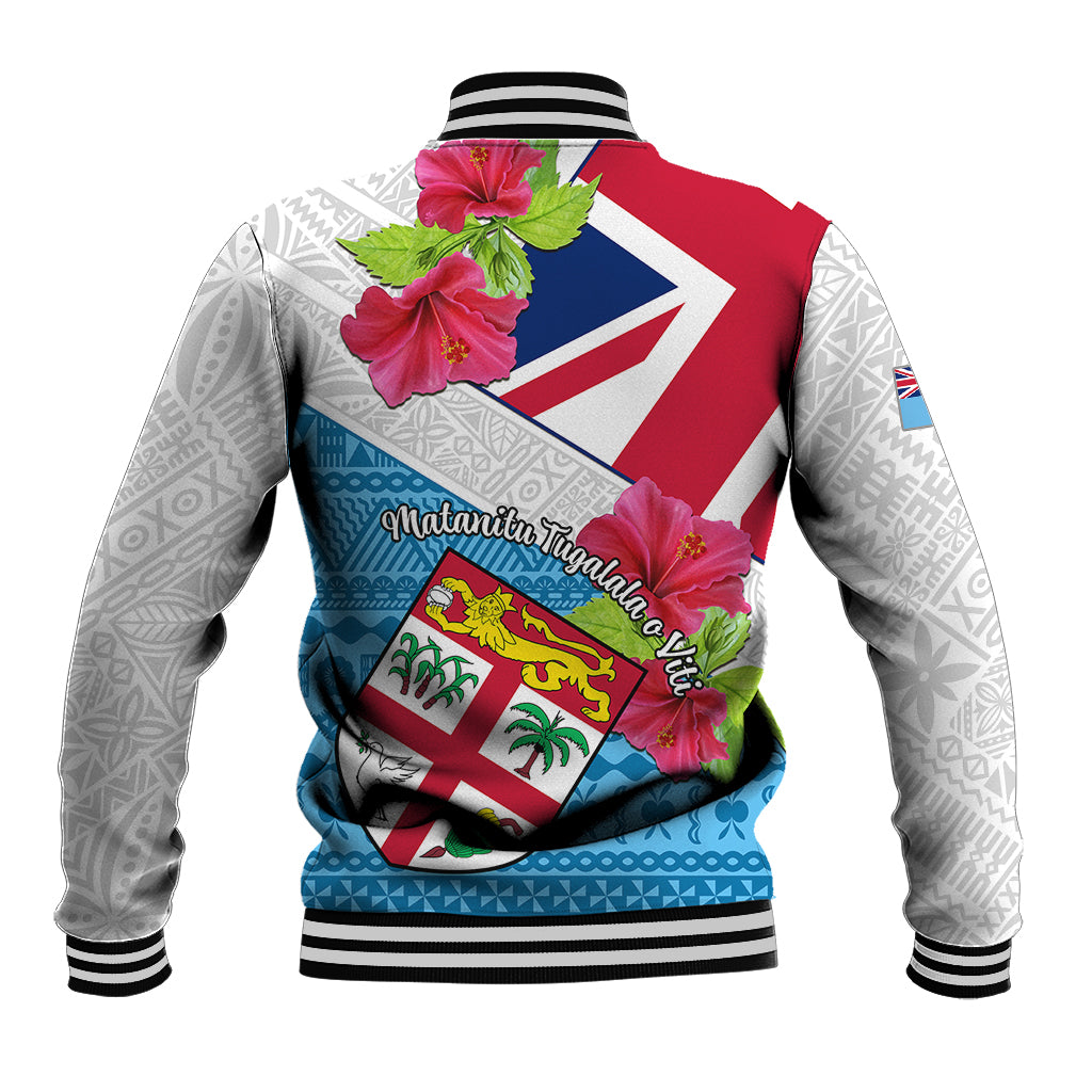 Baseball jacket showing red and blue back graphic with hibiscus flowers; striped rib cuffs