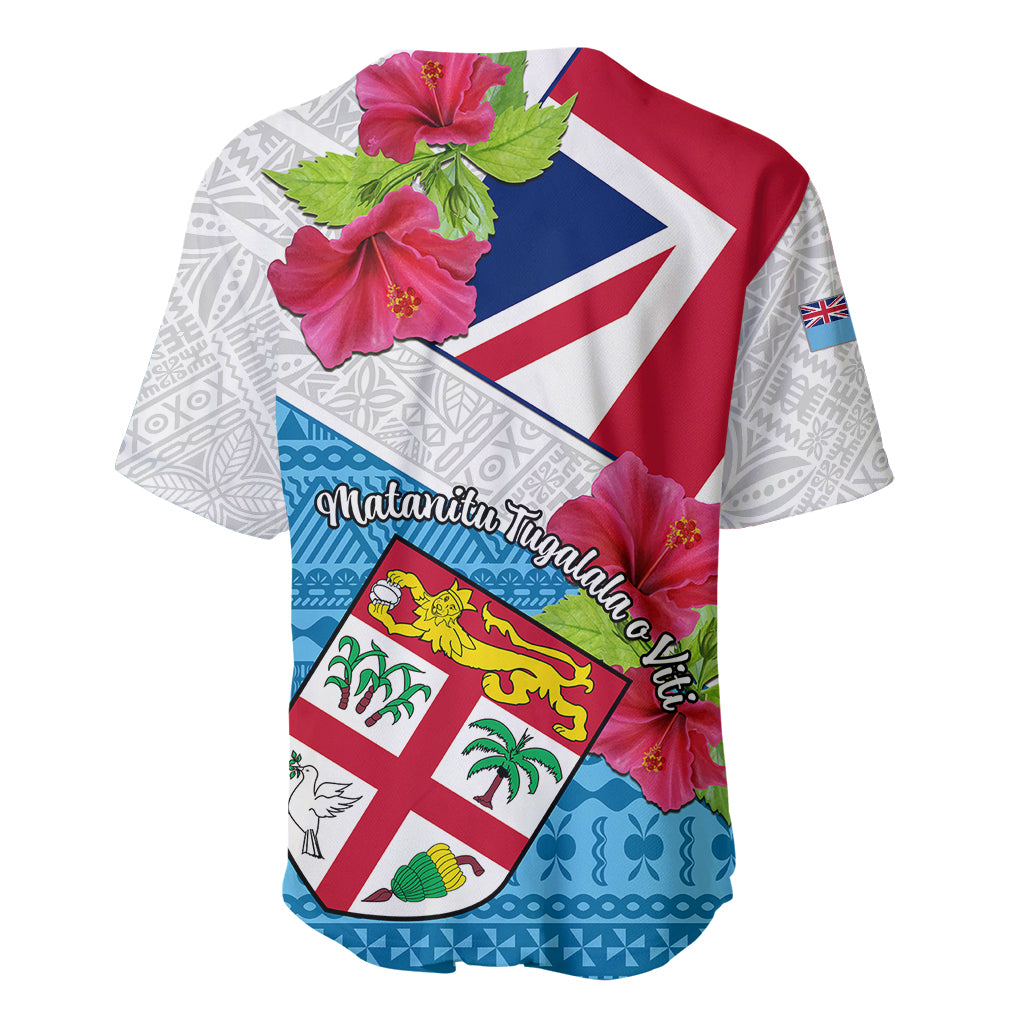 White baseball jersey with red and blue flag graphic, pink hibiscus and patterned hem