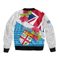 Unisex bomber jacket with hibiscus floral graphic, shield artwork, and black ribbed cuffs
