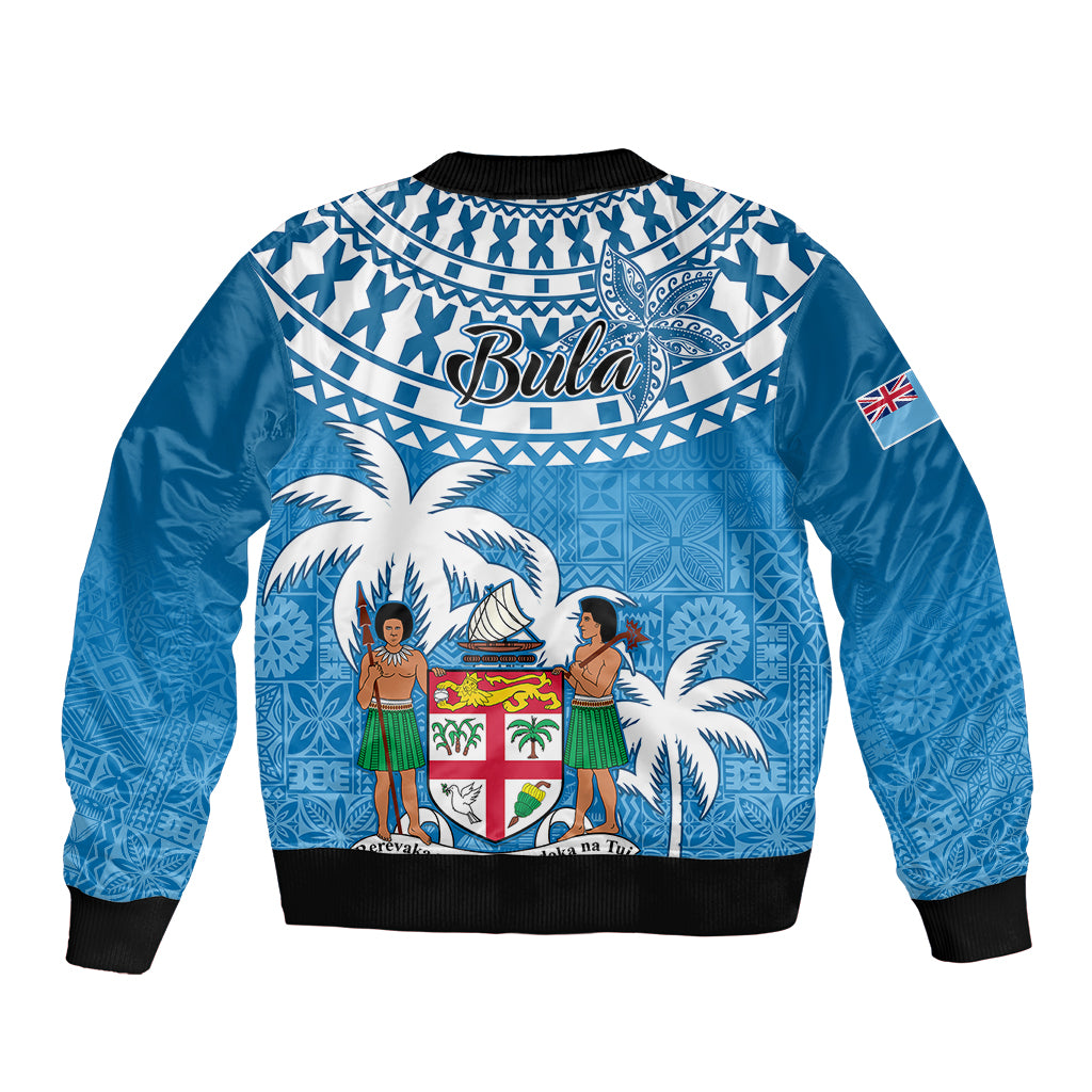 Blue bomber jacket, back graphic with palm trees, Bula text, ribbed hem and cuffs