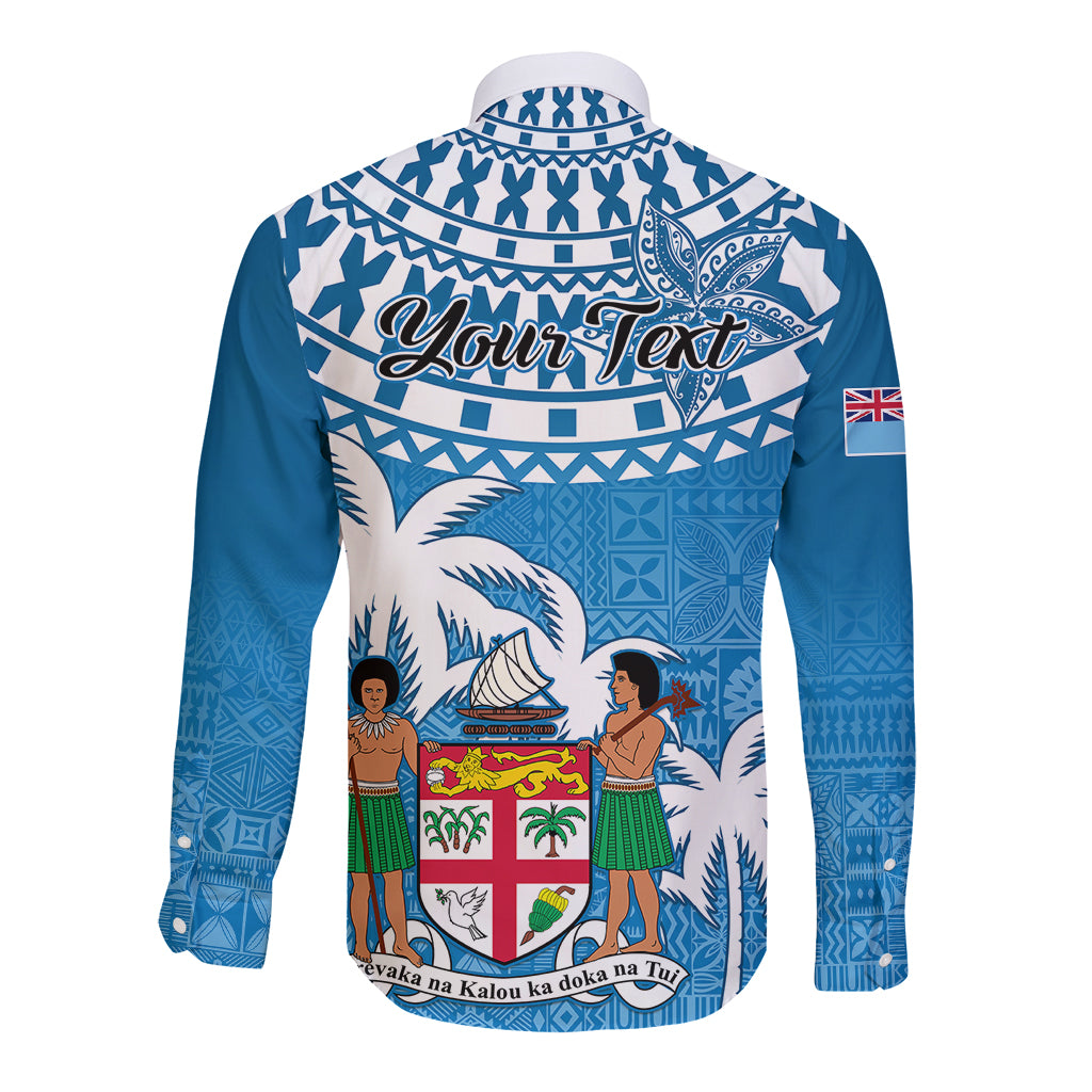 Blue long-sleeve button shirt with tapa pattern on back, sail-and-figure art and Your Text