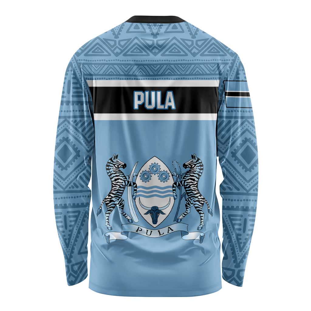 Blue long-sleeve shirt, back graphic with PULA text and geometric border pattern