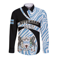 Long sleeve button shirt with blue zebra pattern and Botswana-style graphic front