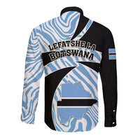 Long sleeve button shirt, blue zebra pattern with bold black-and-blue back graphic