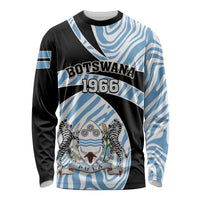Long-sleeve shirt with black and blue zebra-style swirl graphic, text and emblem