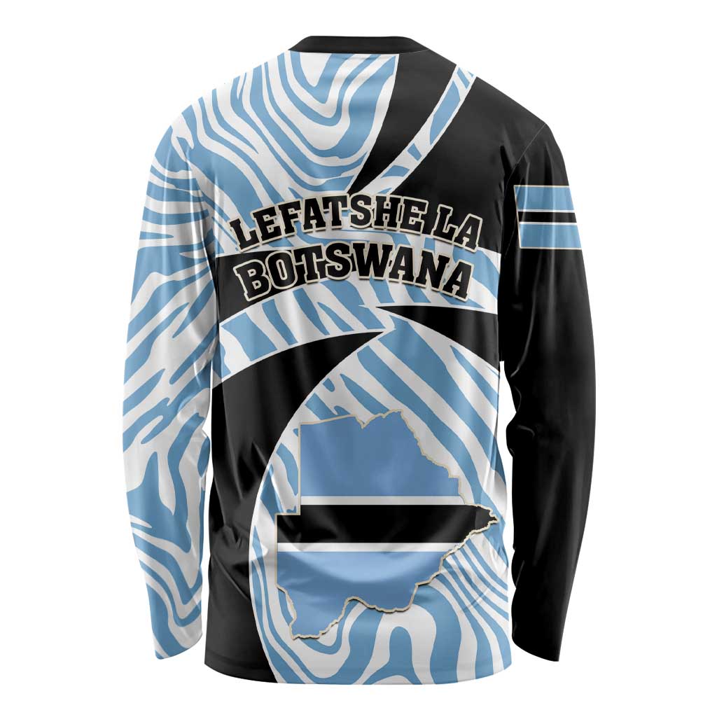 Long-sleeve shirt back view in black and blue with zebra swirl print and text