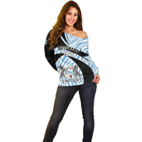 Women’s off-shoulder sweater front, blue/black zebra stripes with Botswana crest and 1966