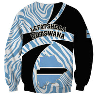 Unisex sweatshirt with zebra pattern, 'LEFATSH'E LA BOTSWANA' text and Botswana map graphic