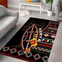 Black Kenya-themed area rug with shield emblem, red and green geometric bands, flowers