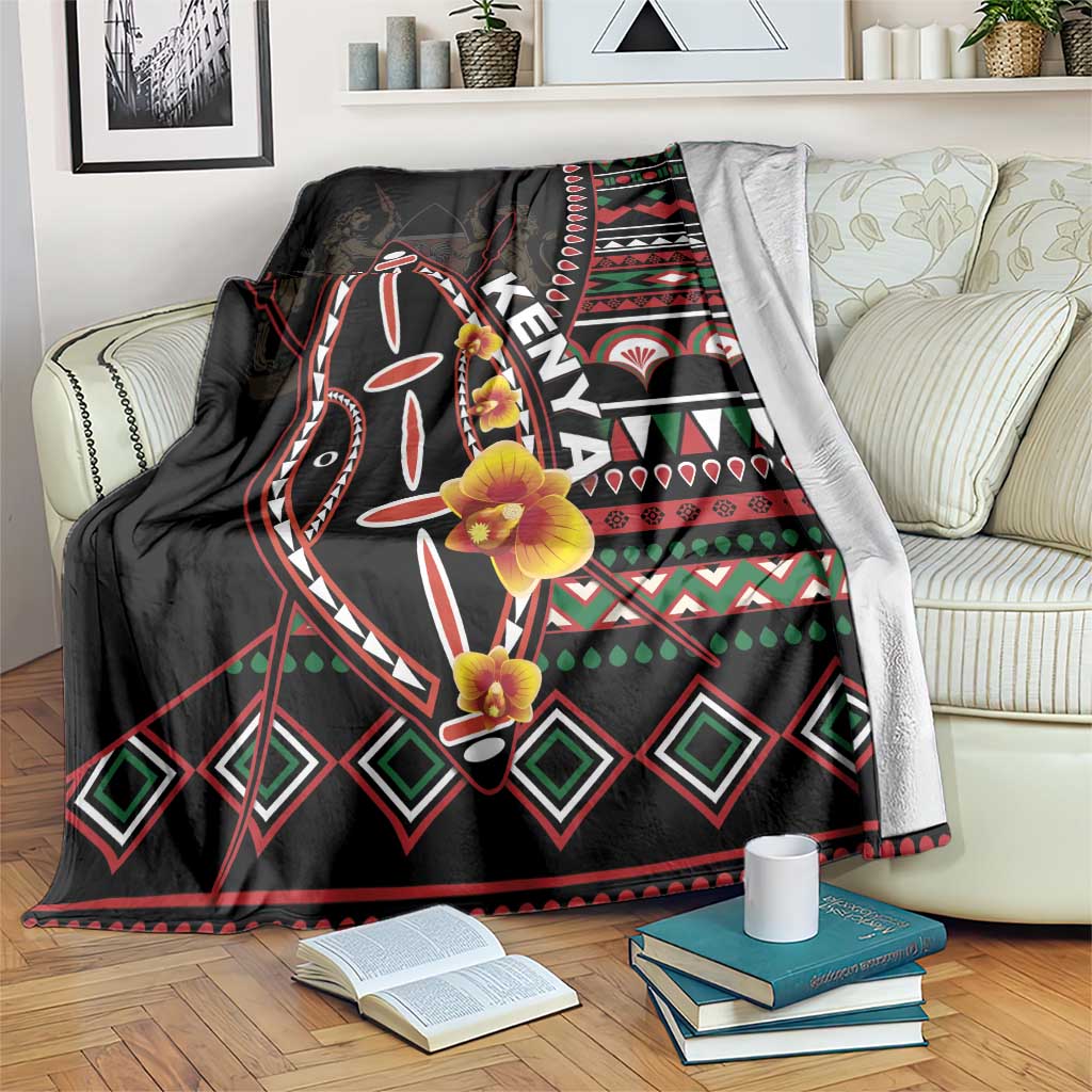 Black Kenya throw blanket with central shield graphic, red green white stripes, and flower print