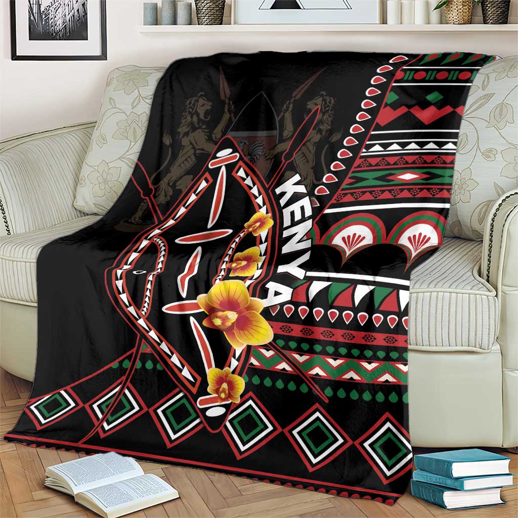 Black Kenya blanket with stylized shield and animal figure, red green white motifs, and trim