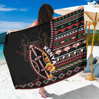 Black sarong with colorful geometric tribal pattern and floral accents, beach wrap