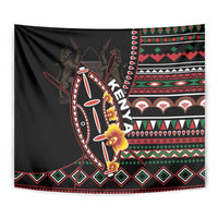 Black tapestry wall hanging close-up of colorful shield, flower accents, and borders