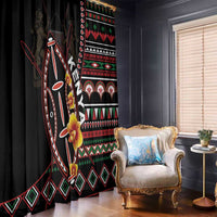 Black window curtain panels with red, green, and white tribal shield and floral accents