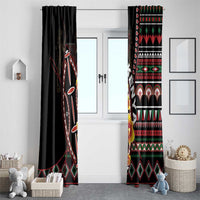 Black window curtain pair with red, green, and white geometric tribal border at bottom