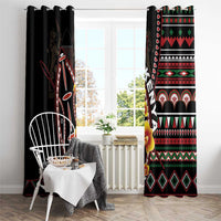 Black window curtain pair on a rod, featuring red, green, and white tribal shield patterns