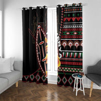 Black window curtains with red, green, and white horizontal tribal bands and diamond trim