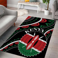 Black area rug with Kenya lettering and bold red, green, white circular tribal motifs