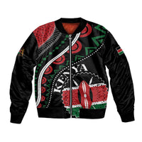 Black bomber jacket with colorful African graphic patch print, ribbed cuffs
